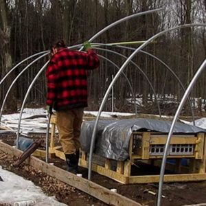 anchoring the hoop house poles